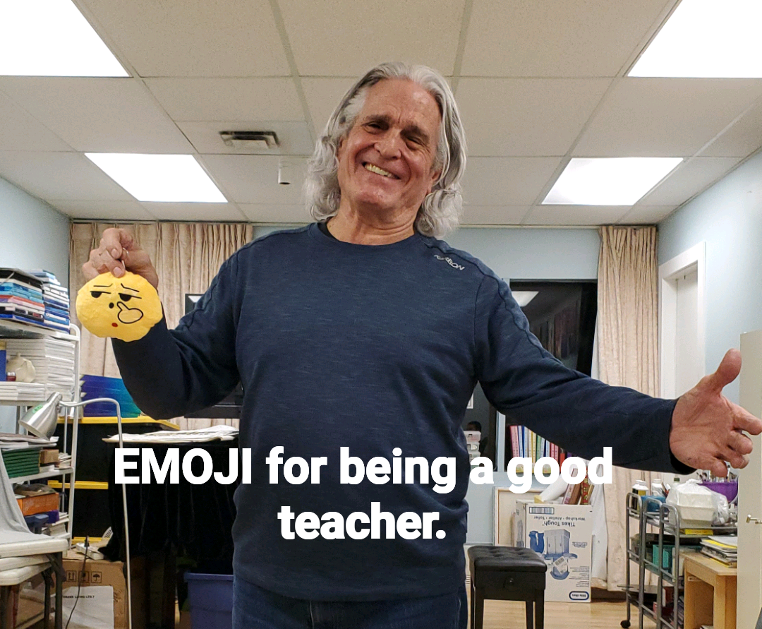 A man giving a presentation to people in an office