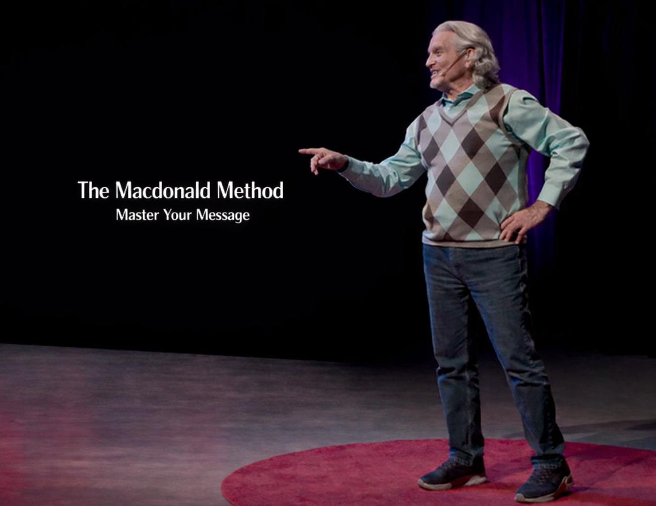 Woman speaking in front of a crowd